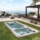 Swim spa Twin, con dos habitaculos preparadaos para el hidromasaje en una terraza con bonitas vistas al mar